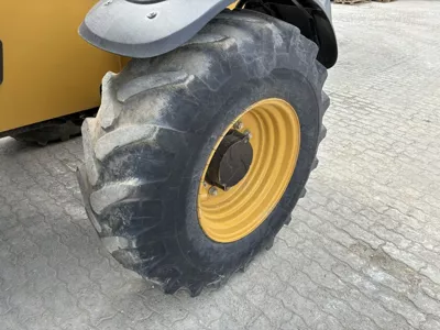 113477