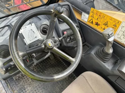 113477